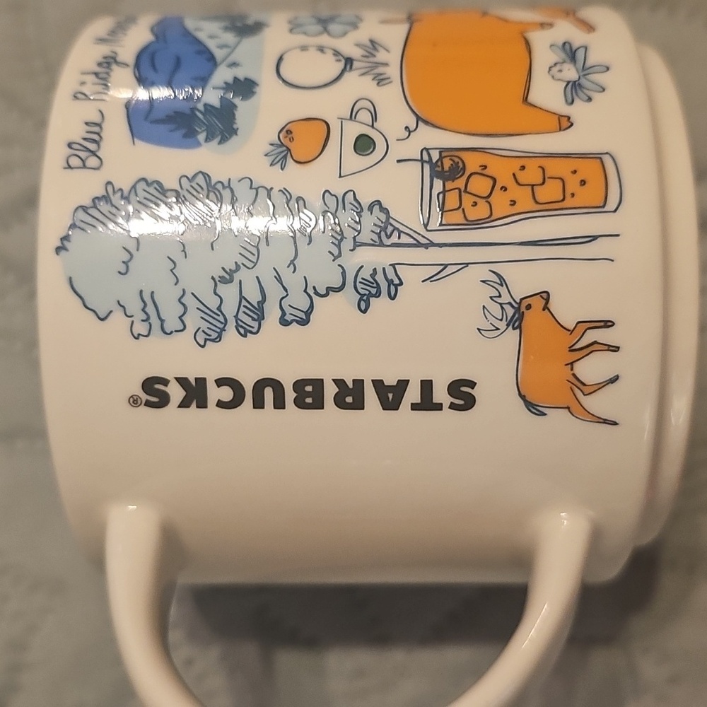 Starbucks White Mug with Blue and Orange Illustrations